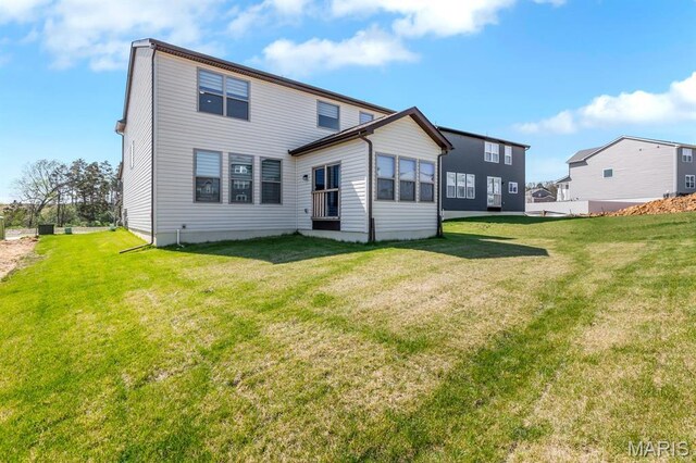 536 Edison Way, Wentzville, MO 63385 - rear view of house with a yard