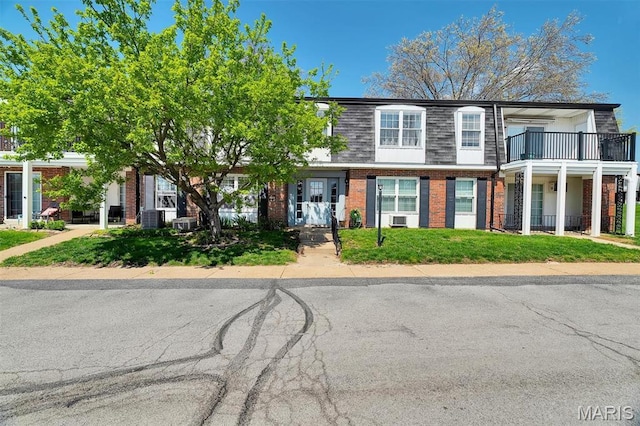 1707 Mayenne Ct Unit B, Saint Louis, MO 63125 - multi unit property featuring brick siding, mansard roof, a balcony, and cooling unit