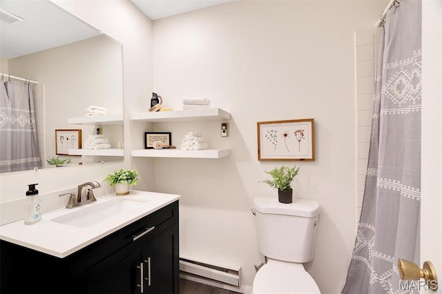 1707 Mayenne Ct Unit B, Saint Louis, MO 63125 - full bath featuring a baseboard radiator, toilet, and vanity