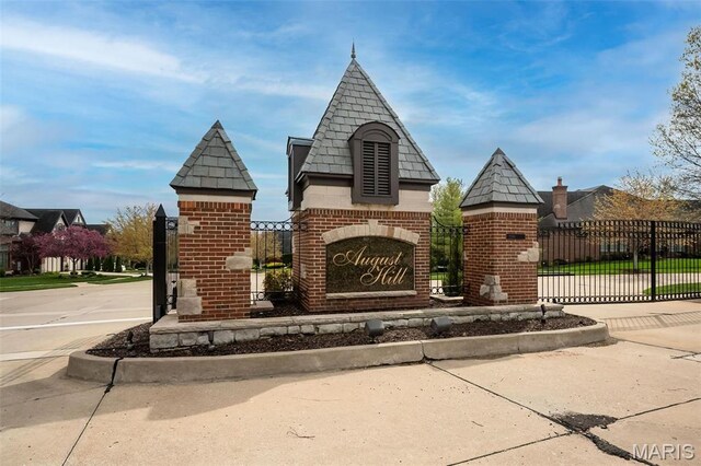 view of building exterior featuring fence