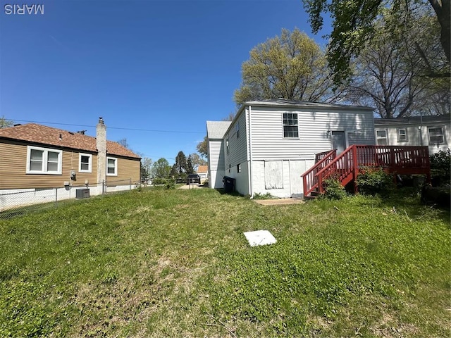 8818 Kendale Dr, Saint Louis, MO 63121 - view of yard with a wooden deck and central AC