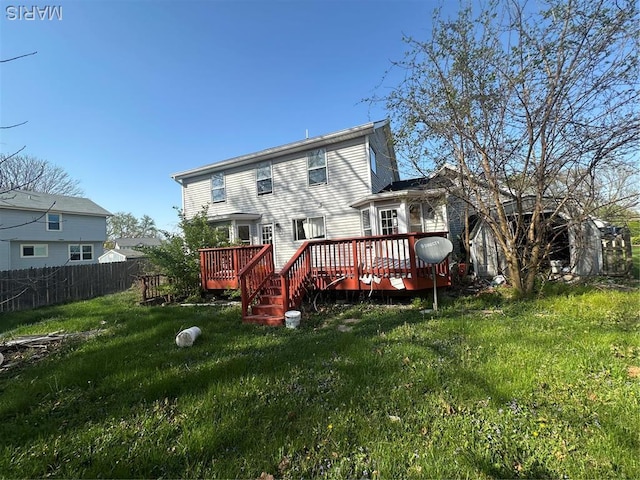 2932 Sherwood Dr, Florissant, MO 63031 - back of house with a wooden deck