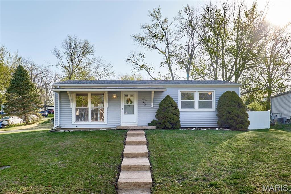 view of front of home with central AC unit