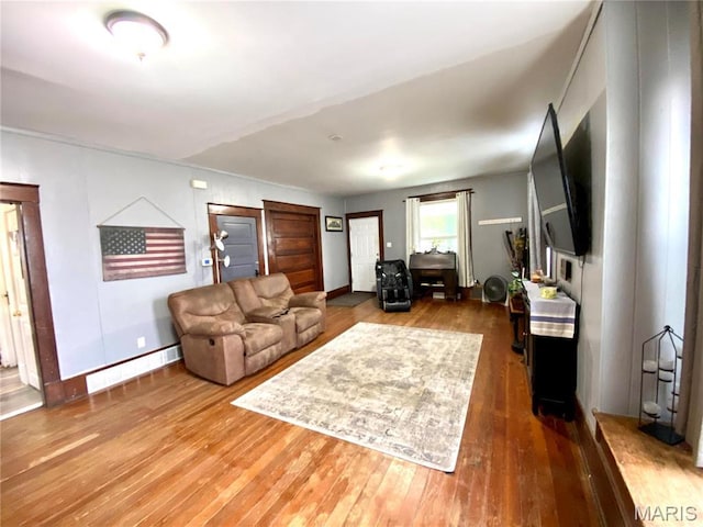 111 SE St, Wellsville, MO 63384 - living room with hardwood / wood-style floors and baseboards