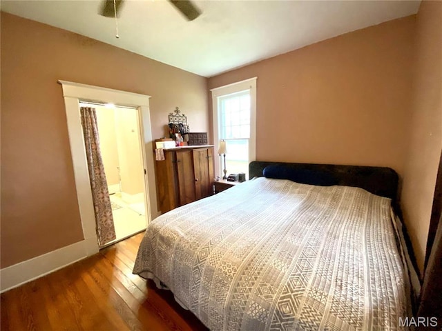 111 SE St, Wellsville, MO 63384 - bedroom featuring wood finished floors, baseboards, and ceiling fan