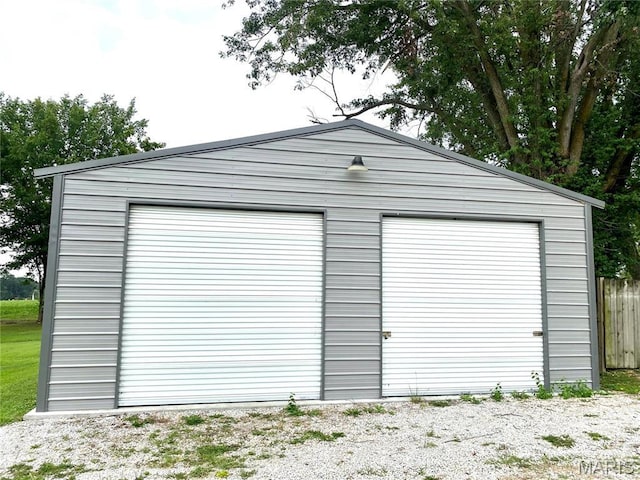 111 SE St, Wellsville, MO 63384 - detached garage featuring fence