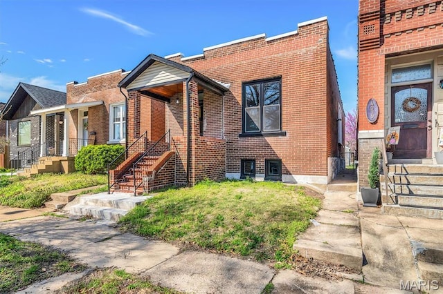4021 Winnebago St, Saint Louis, MO 63116 - view of front of property featuring brick siding and stairway
