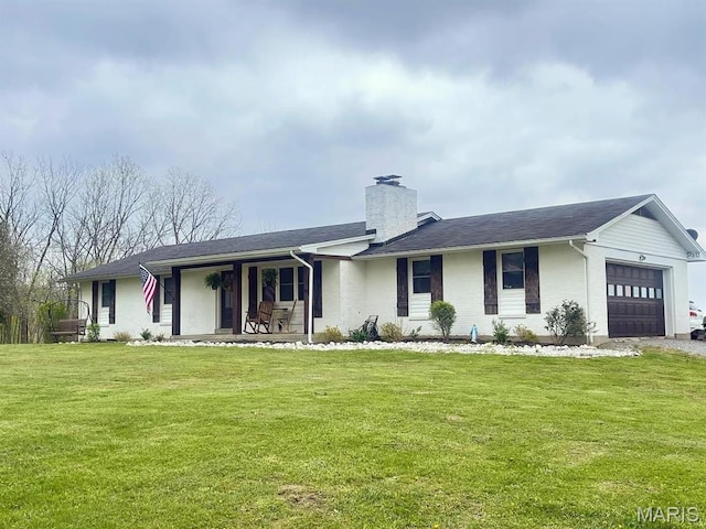 ranch-style house featuring an attached garage, covered porch, a chimney, a front lawn, and brick siding