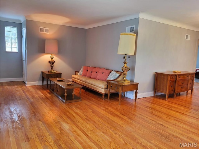 8303 Knollwood Dr, Saint Louis, MO 63121 - living room with light wood-style flooring and baseboards
