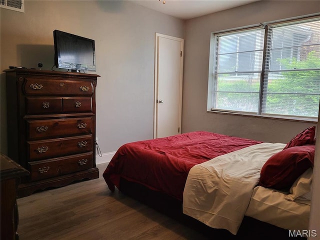8303 Knollwood Dr, Saint Louis, MO 63121 - bedroom featuring wood finished floors