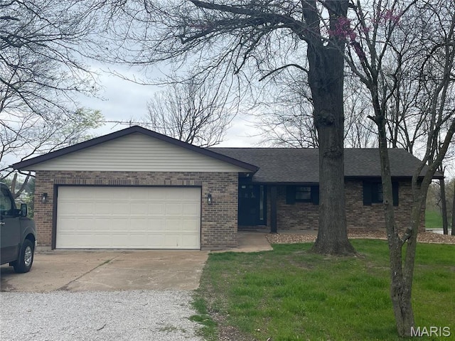 5826 Grandview Ter, Waterloo, IL 62298 - ranch-style home featuring brick siding, driveway, an attached garage, and roof with shingles