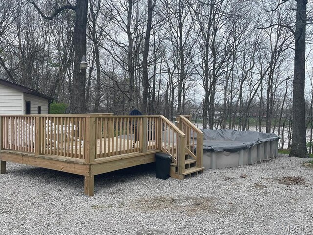 5826 Grandview Ter, Waterloo, IL 62298 - deck with a covered pool and view of scattered trees