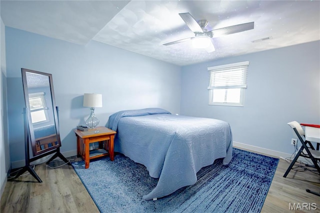 5826 Grandview Ter, Waterloo, IL 62298 - bedroom with light wood finished floors, baseboards, and a ceiling fan