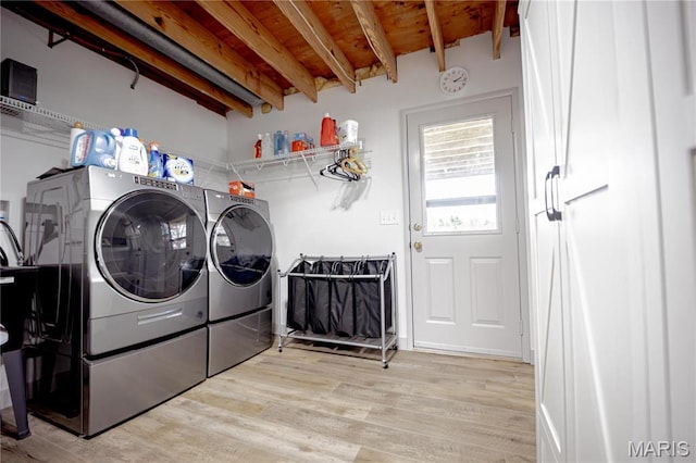 5826 Grandview Ter, Waterloo, IL 62298 - laundry area featuring washer and dryer and light wood-style flooring