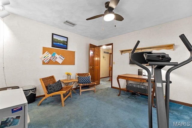 411 S High St, Belleville, IL 62220 - living area featuring ceiling fan, carpet, and baseboards