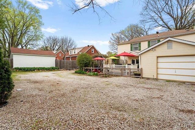 411 S High St, Belleville, IL 62220 - view of yard with fence and driveway