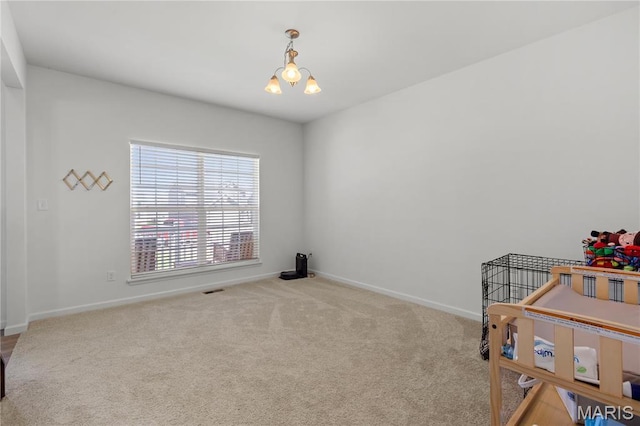 809 Colony Ridge Ct, Foristell, MO 63348 - carpeted bedroom with baseboards and a chandelier