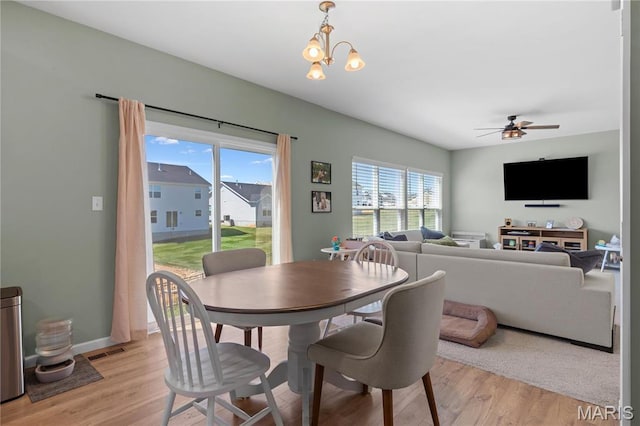 809 Colony Ridge Ct, Foristell, MO 63348 - dining area featuring a ceiling fan, light wood finished floors, and baseboards