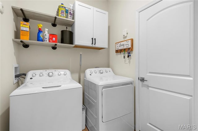 809 Colony Ridge Ct, Foristell, MO 63348 - washroom featuring cabinet space and washer and dryer