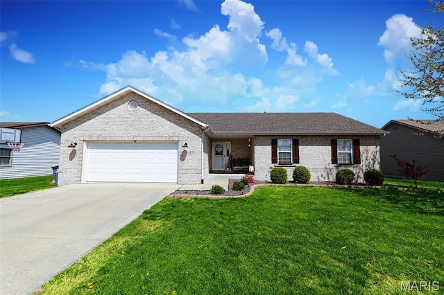 2605 Buenger Blvd, Granite City, IL 62040 - ranch-style house featuring a garage, brick siding, driveway, and a front yard