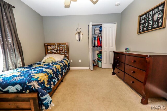 2605 Buenger Blvd, Granite City, IL 62040 - bedroom featuring light colored carpet, a closet, a ceiling fan, and baseboards