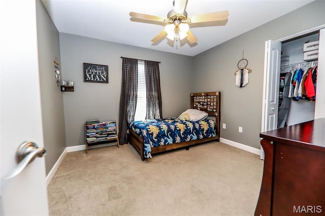 2605 Buenger Blvd, Granite City, IL 62040 - bedroom with light colored carpet, baseboards, ceiling fan, and a closet