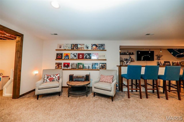 2605 Buenger Blvd, Granite City, IL 62040 - sitting room with carpet flooring, bar, and baseboards