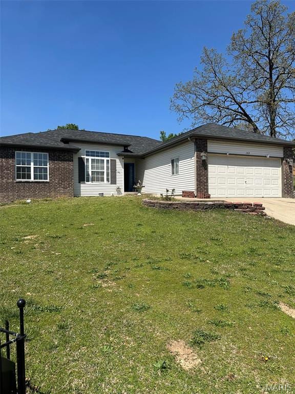 142 Oregon Ln, Kimberling City, MO 65686 - ranch-style home with an attached garage, brick siding, and driveway