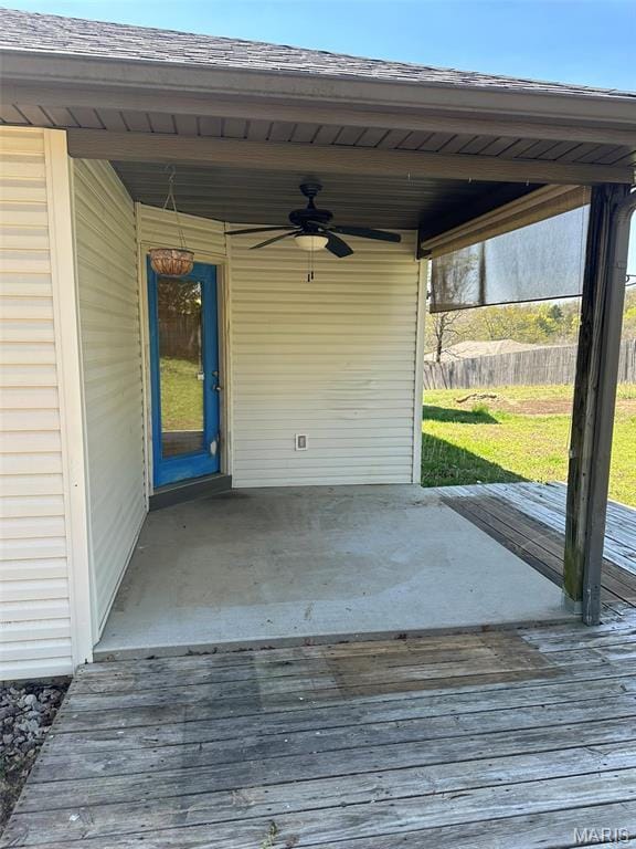 142 Oregon Ln, Kimberling City, MO 65686 - wooden deck with ceiling fan and a lawn