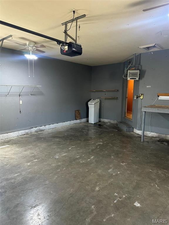 142 Oregon Ln, Kimberling City, MO 65686 - garage featuring a garage door opener