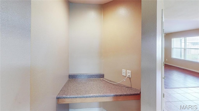142 Oregon Ln, Kimberling City, MO 65686 - bathroom featuring a textured wall and tile patterned flooring