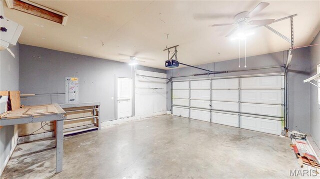 142 Oregon Ln, Kimberling City, MO 65686 - garage featuring a garage door opener and ceiling fan