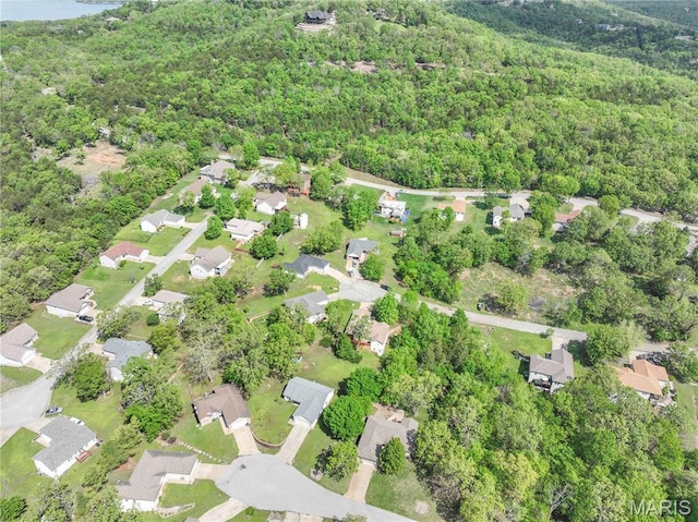 142 Oregon Ln, Kimberling City, MO 65686 - aerial overview of property's location featuring a heavily wooded area and nearby suburban area