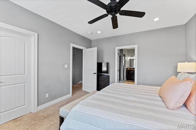 3884 Wyoming St, Saint Louis, MO 63116 - bedroom with carpet, baseboards, recessed lighting, connected bathroom, and ceiling fan
