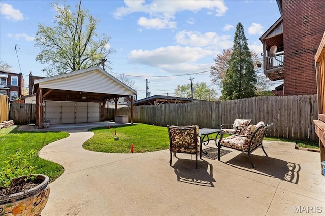 3884 Wyoming St, Saint Louis, MO 63116 - view of patio / terrace with a garage and an outdoor structure