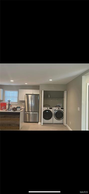329 Rutledge St, Worden, IL 62097 - washroom featuring separate washer and dryer and baseboards