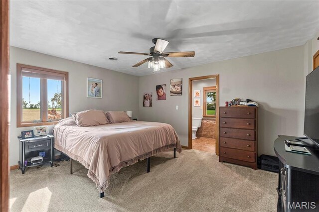 218 County Highway 275, Oran, MO 63771 - bedroom featuring light colored carpet, ceiling fan, and baseboards