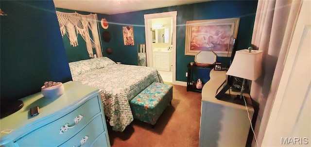 bedroom featuring carpet floors and ensuite bath