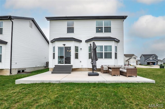 rear view of property with an outdoor hangout area, entry steps, a yard, and a patio area