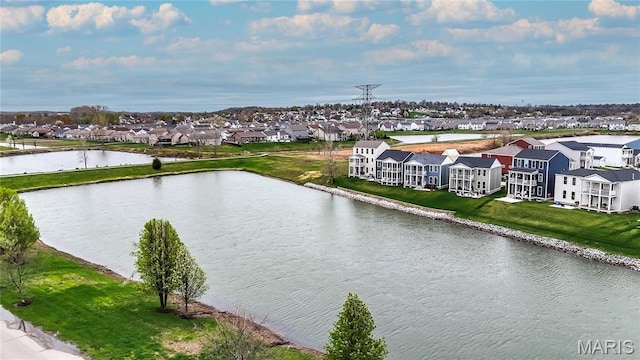 aerial perspective of suburban area featuring a large body of water