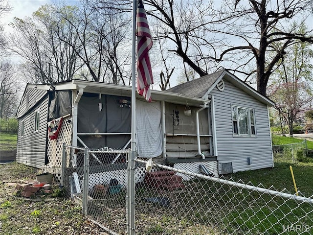 17 Labonte Dr, Saint Charles, MO 63304 - view of front of home with fence and roof with shingles