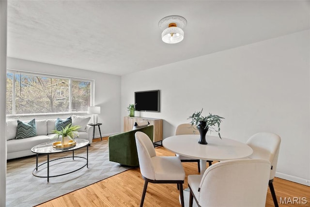 1015 Louisville Ave, Saint Louis, MO 63139 - dining room with wood finished floors and baseboards