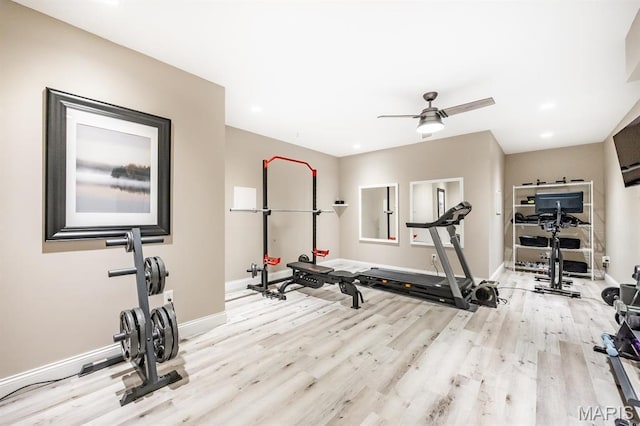 exercise area featuring baseboards, wood finished floors, recessed lighting, and a ceiling fan