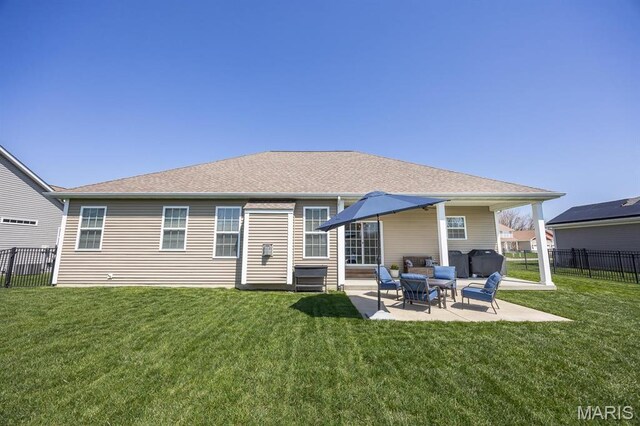 rear view of house featuring a patio area