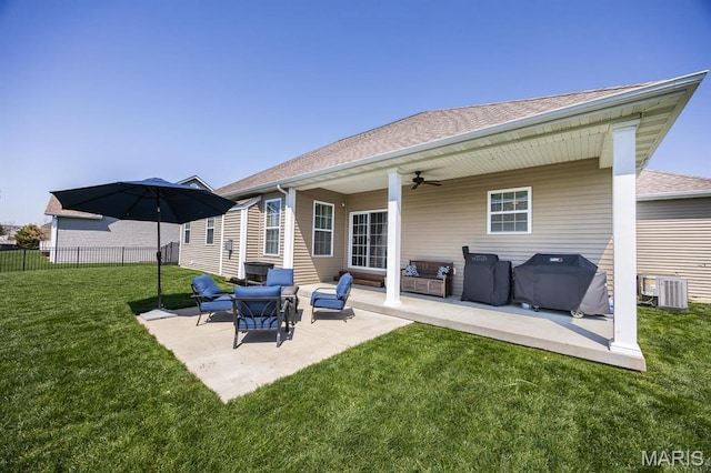 rear view of house with central AC, ceiling fan, a patio, roof with shingles, and an outdoor hangout area