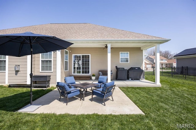 back of house with a ceiling fan, a patio, an outdoor hangout area, and a shingled roof