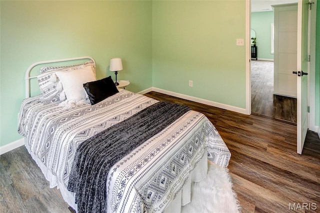 731 Dugger St, Bethalto, IL 62010 - bedroom with baseboards and wood finished floors
