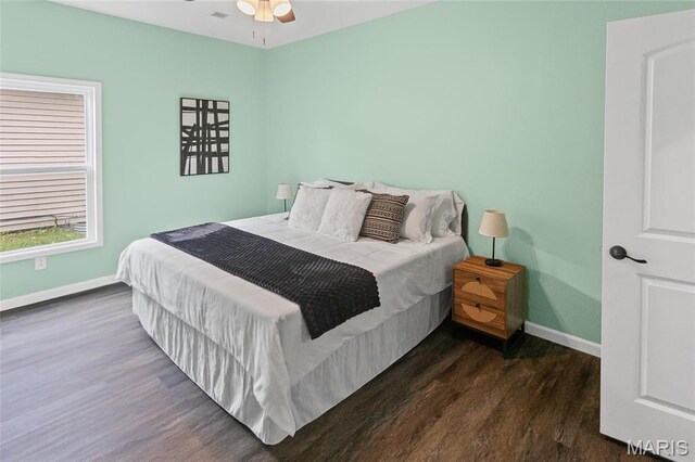 731 Dugger St, Bethalto, IL 62010 - bedroom featuring wood finished floors and baseboards
