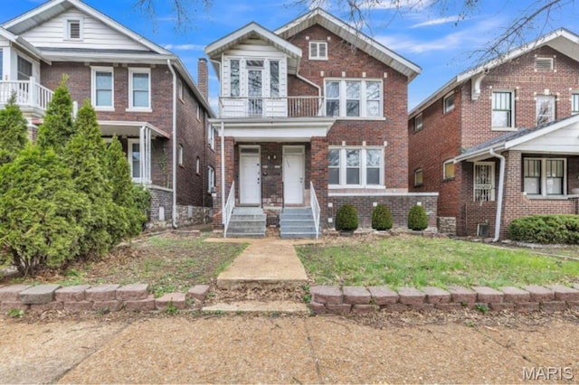 4931 Mardel Ave, Saint Louis, MO 63109 - view of front of house featuring brick siding and a balcony
