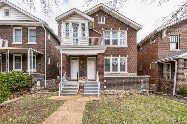 4931 Mardel Ave, Saint Louis, MO 63109 - view of front of property with a balcony and brick siding